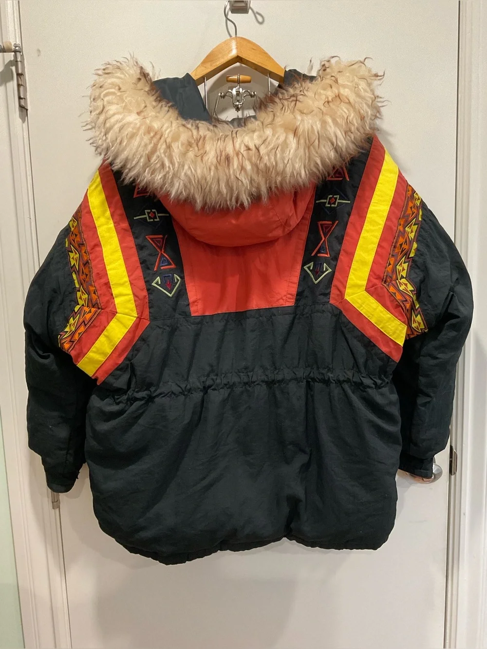 This vintage Triple F.A.T. Goose duck down ski parka features a striking.